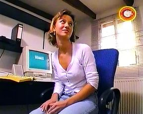 Sexy German secretary sucks and jerks off a dick in the office